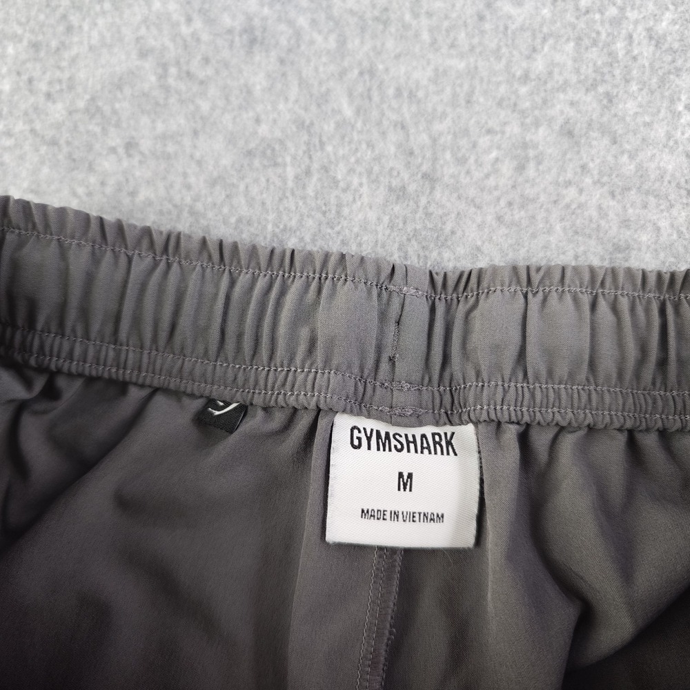 Gymshark Arrival Woven Joggers Mens Medium Silhouette Gray Zip Ankle Slim - Picture 9 of 13